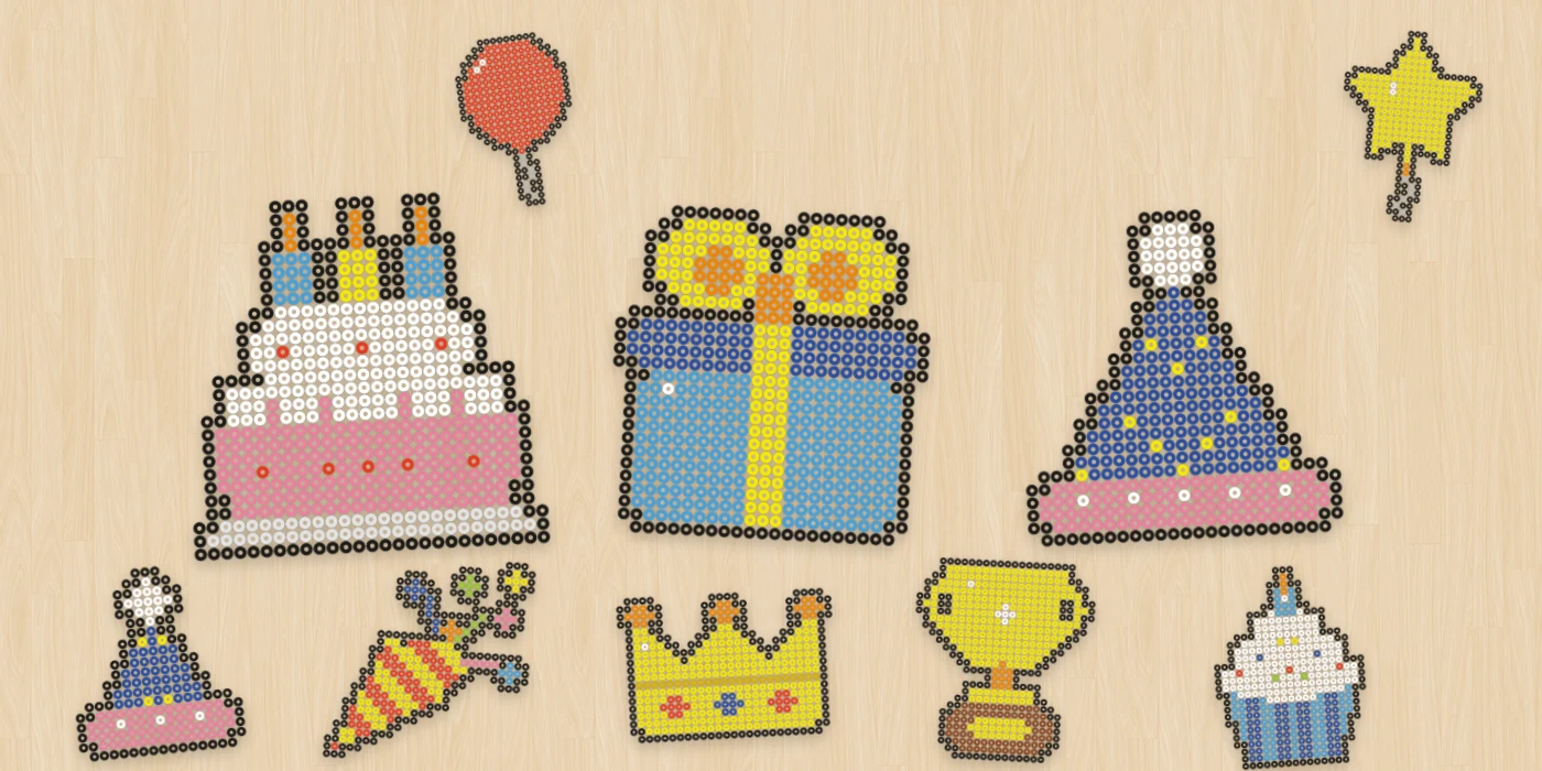 アイロンビーズの誕生日・お祝い図案（バースデーケーキ、プレゼント、風船、とんがり帽子、王冠など）を並べたイメージ
